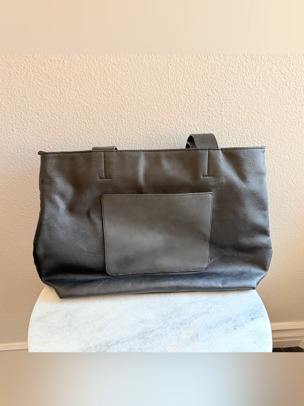 Universal Tread black faux leather tote purse